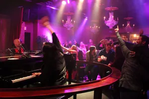 Dueling Piano Players engaging with the crown at Jewel Speakeasy