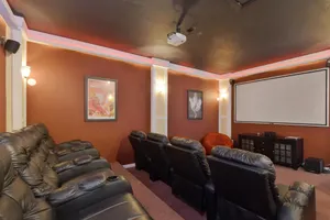 Some of our homes feature movie theaters with projector screens.