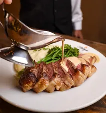 Picanha à la Carte – The ultimate picanha steakhouse experience. A special cut of Brazilian cuisine, grilled to perfection and paired with peppercorn sauce, garlic broccolini, and mashed potatoes. A true classic, elevated with flavor and tradition.
