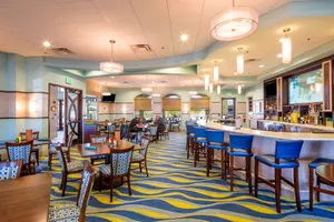 The Oasis Grille in ChampionsGate is the perfect spot to grab a bite to eat or a drink.