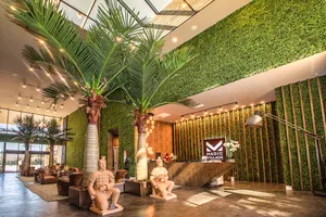 Reception center hosts restaurant, fitness center, pool area with tennis court and volleyball court
