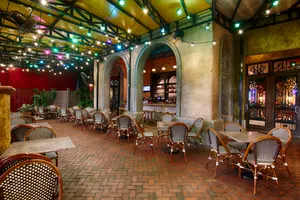 Miramar meaning "View to the Sea" is a perfect description of our courtyard and building exterior, reflecting the general theme of the coast of Havana and its sea wall. Woven chairs and mosaic tables provide a relaxed setting for the outdoor patio and bar. This area is surrounded by a wrought iron railing, colorful flowers, trailing vines and palm trees.
