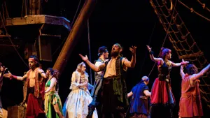 Pirates, Princess Anita, and Treasure, the captain's wife in the middle of the song, A Pirate's Life, during the show.