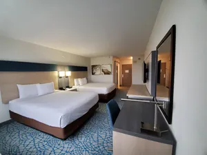 Newly renovated room with two queen beds