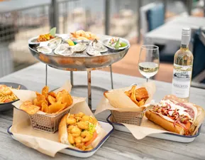 Enjoy Seafood on our rooftop deck for 360 views of Disney Springs!