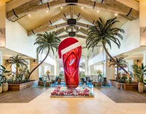 The iconic flip flop with a Santa hat on it.