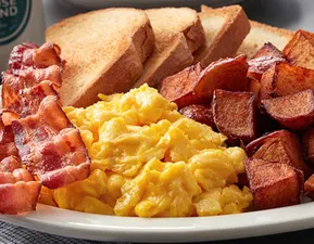Eggs any style, hashbrowns, toast and choice of meat: bacon, sausage patties, sausage links, turkey sausage or Canadian bacon.