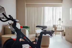 Peloton equipment in the comfort of your own Wellness Suite