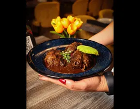 A traditional Dominican classic rich in flavor, crafted to highlight bold spices and deliver an authentic experience in every bite.