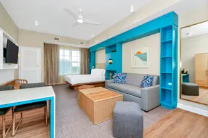 Enjoy a free made-to-order breakfast and Evening Reception featuring beer, wine, premium spirits, and light snacks. Includes WiFi, a sofa bed, microwave, refrigerator a 55-inch HDTV as well as a hairdryer, in-room safe, iron and coffeemaker.