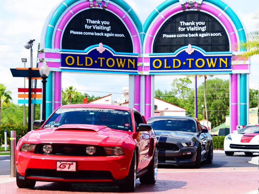 Join the heart pounding excitement of high-performance engines and true horse power for our Muscle Car Show and Cruise every Friday night.  Old Town invites show-quality muscle and factory-performance cars* from 1964 and newer and classics from 1983 and older to join others in the ultimate display of engine power.  Cars begin showing up late afternoon and then show off these muscle machines as they drive down the Main Street of Old Town at 8:30pm.
It’s free to participate!  Enter Old Town from Highway 192, under the east (left) side of the Jukebox sign.  Our Event Staff will be there to greet each car.  They will register your car and direct you to a security escort down the brick streets. Please do not drive on the bricks without permission.
Weekly cash prizes, drawings and giveaways for our cruisers.
Free live entertainment on Trophy Row Stage beginning at 7:00pm.