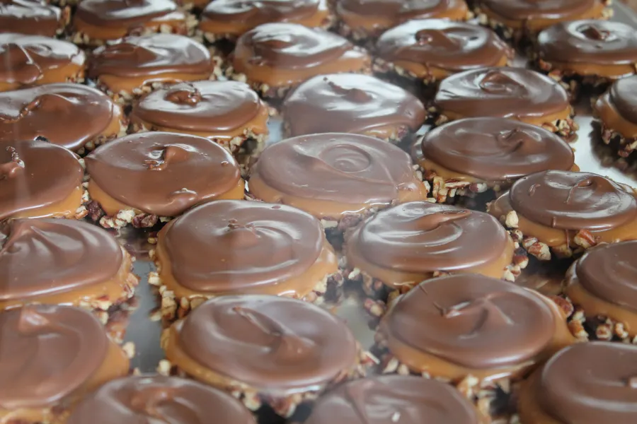 Our Delicious Loggerheads! Pecans, Homemade Caramel and milk, White or Dark Chocolate