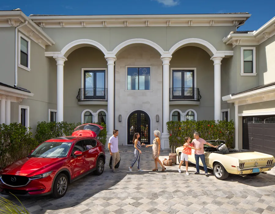Guests arrive in style to begin their unforgettable stay at The Luxury Bowling Mansion (RVH_598)