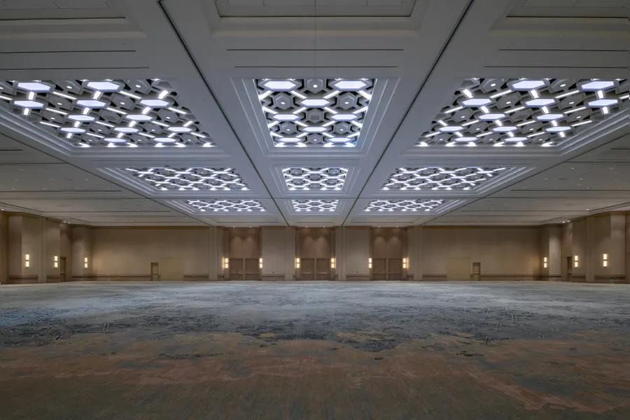 Coastal Ballroom – A modern event space enhanced by dynamic LED lighting and ocean-hued carpet inspired by coastal tones.