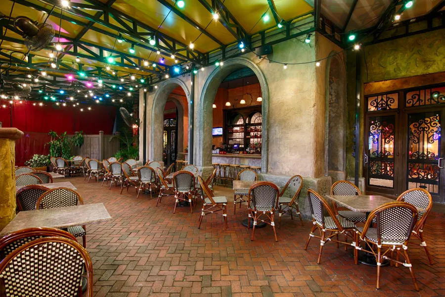Miramar meaning "View to the Sea" is a perfect description of our courtyard and building exterior, reflecting the general theme of the coast of Havana and its sea wall. Woven chairs and mosaic tables provide a relaxed setting for the outdoor patio and bar. This area is surrounded by a wrought iron railing, colorful flowers, trailing vines and palm trees.