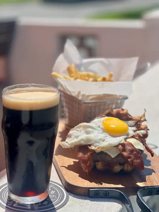 Rejuvenate yourself with our Hangover burger served ona. waffle with a egg on top!  Pairs great with our coffee stout.