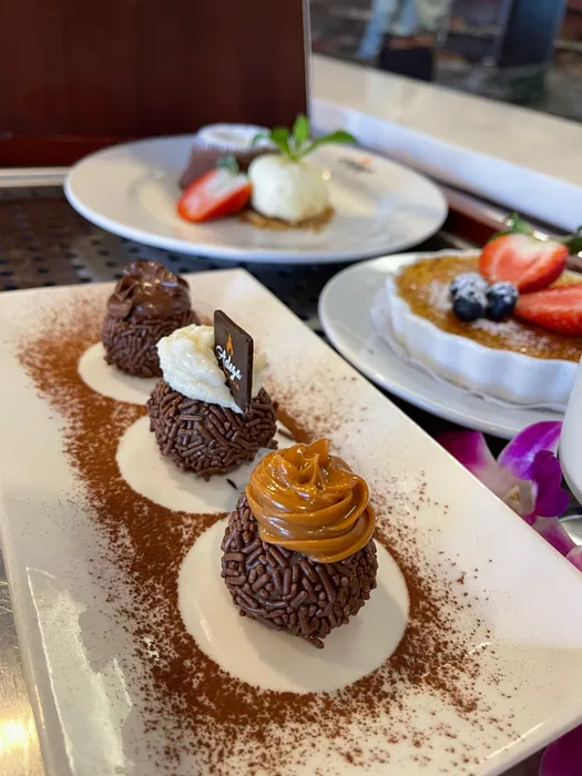 End your dining experience on a sweet note with our irresistible desserts at Adega Gaucha. From rich Caramel Flan to traditional Brazilian dessert favorites like Brigadeiro, every bite feels like a celebration. Craving healthy desserts or looking for a special dessert to share? Discover the perfect finale to your churrasco journey.