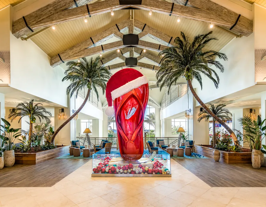 The iconic flip flop with a Santa hat on it.