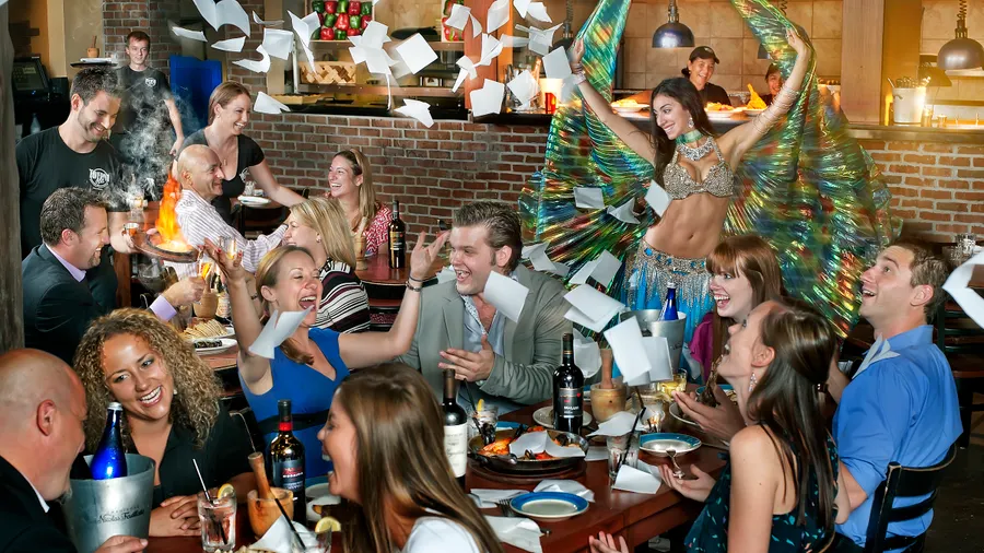 Photo of belly dancer and diners at Taverna Opa.