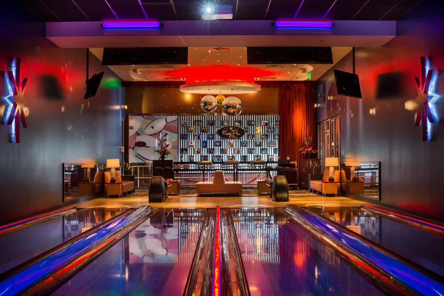 The Private King Pin Room features 4 private lanes, Giant Jenga, Connect-4, plus a private patio attached with a bocce ball/cornhole court 32 guests maximum capacity.