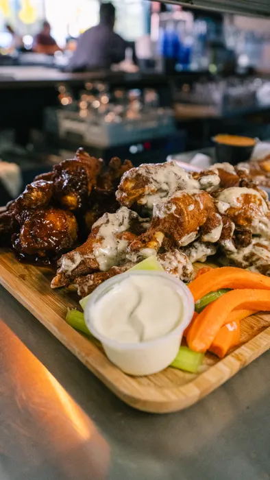 Just Wing - Juicy, Deep Fried, bone-in wings. Choice of Korean Sticky, Garlic Parmesan, Mango Habanero, Celebration Hot or House Dry Rub
